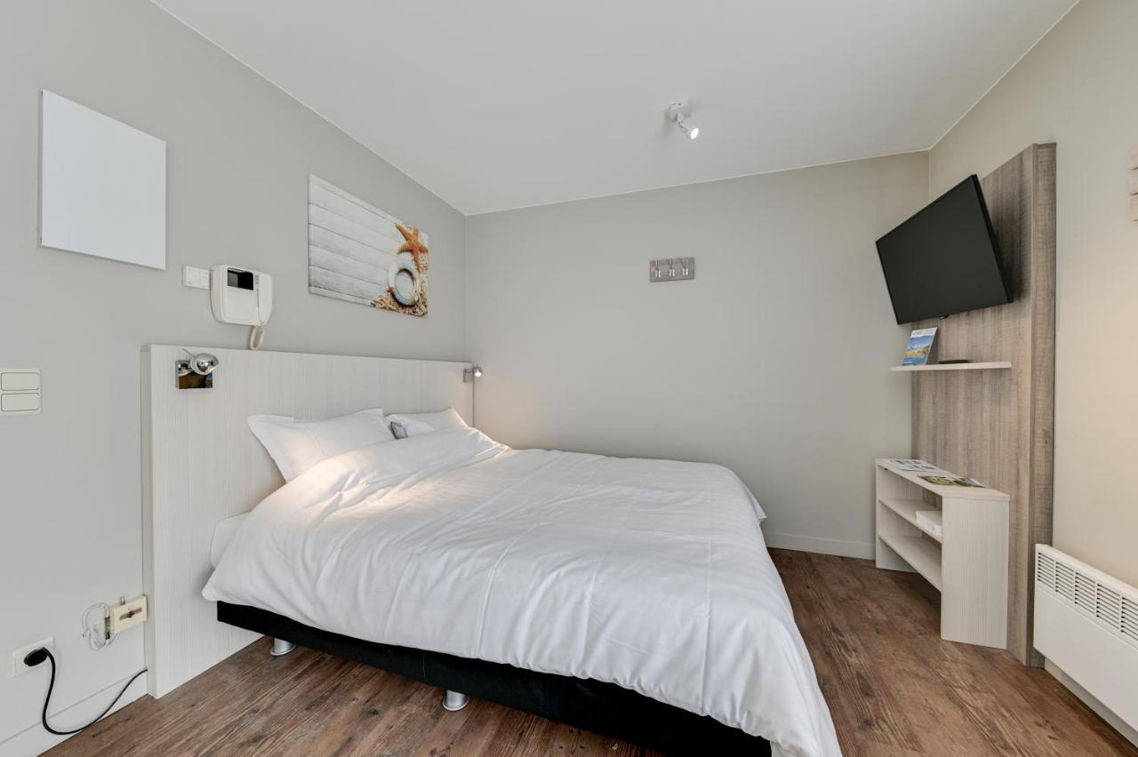 Holiday Suites Де Хаан Екстериор снимка